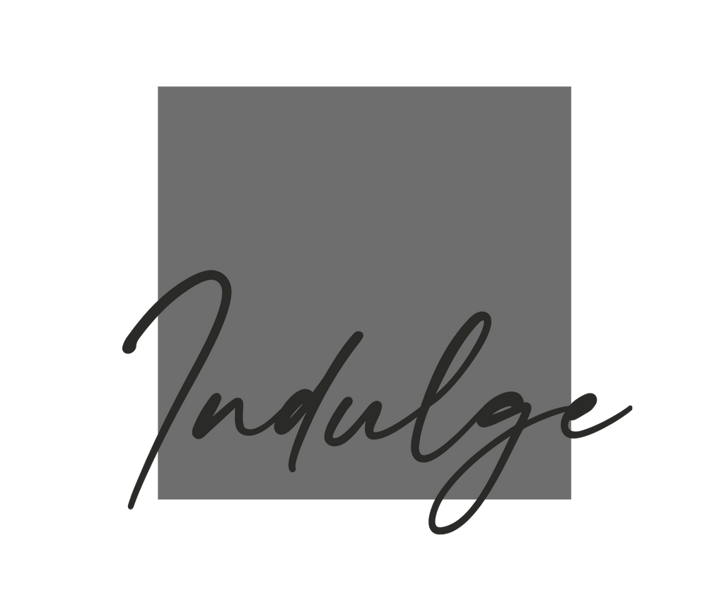 Indulge Black Truffle Hair Care Collection logo